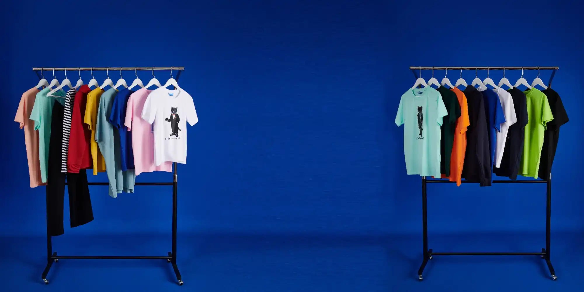 Clothing racks with colorful shirts.